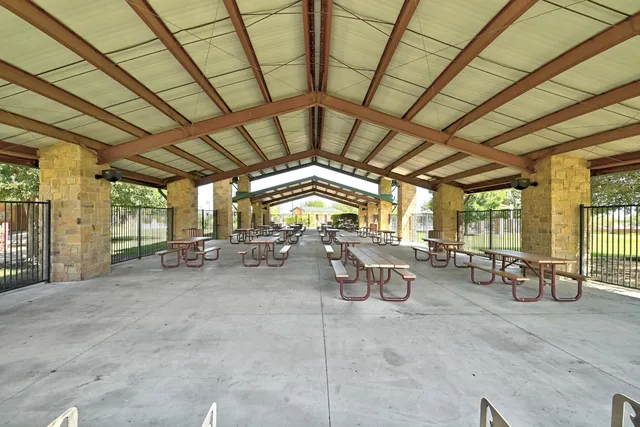 a view of a house with a big yard