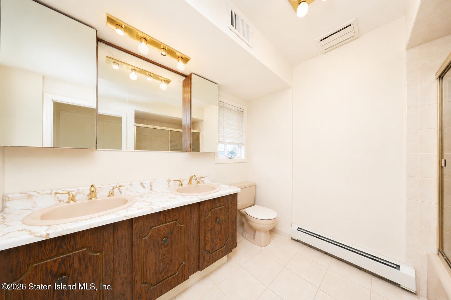 240 Mill Road Staten Island, NY 10306 - Photo 9 of 32 0E960243-147B-46C5-BD1D-E2DAD72A0EAF
