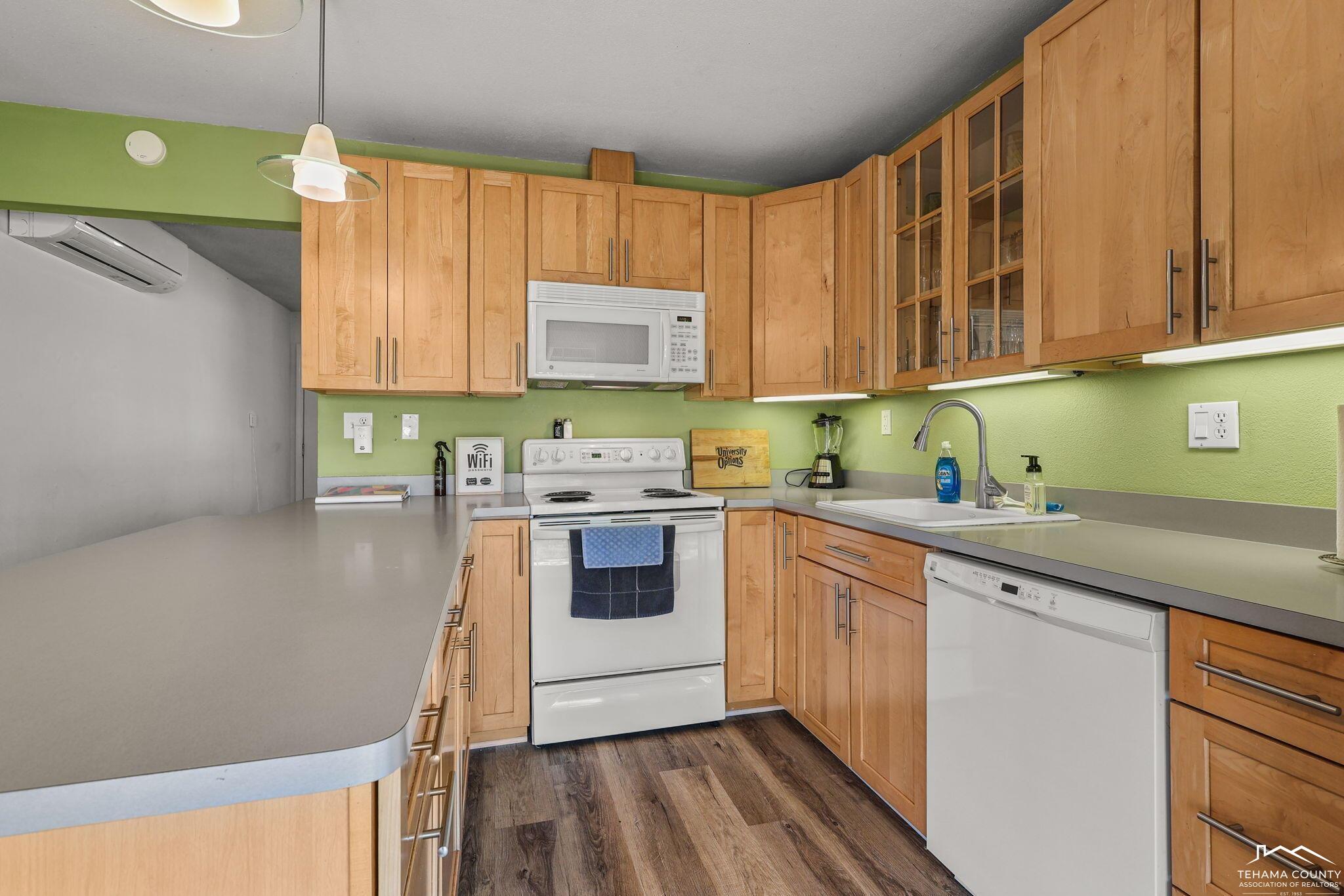 22275 Brent Road Red Bluff, CA 96080 - Photo 11 of 47 a kitchen with stainless steel appliances granite countertop a sink a stove and cabinets