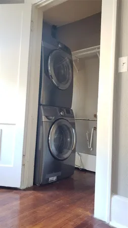 a view of washer and dryer in a bathroom