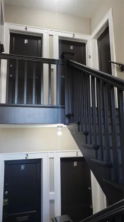 a view of kitchen and wooden floor