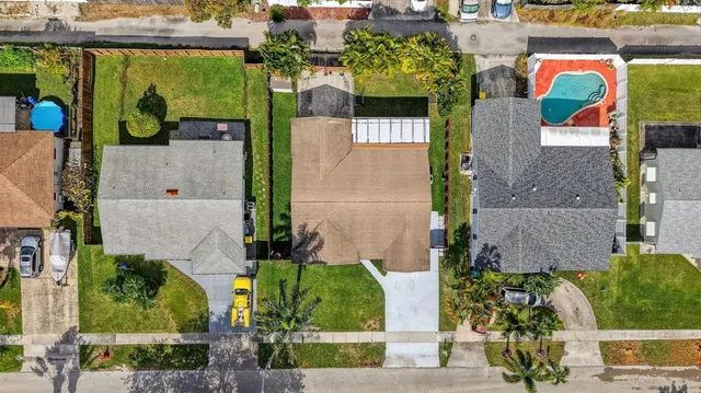 an aerial view of multiple house