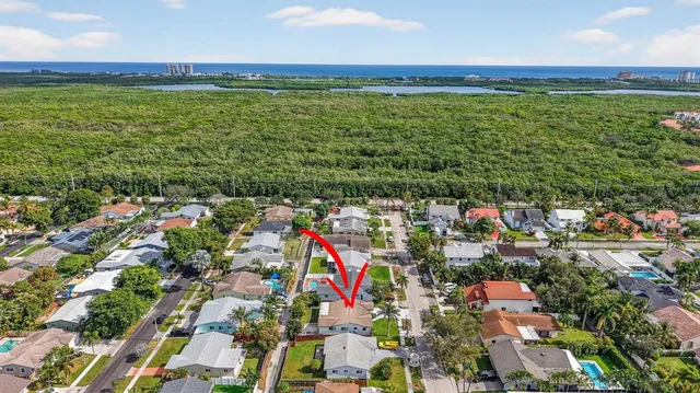 a view of a city with an ocean