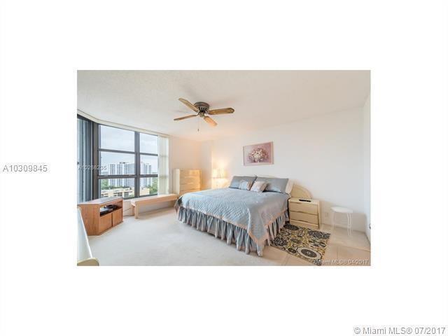 3530 Mystic Pointe Drive, Unit 1603 Aventura, FL 33180 - Photo 15 of 21 Master bedroom
