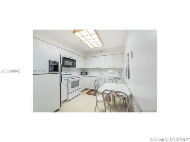 3530 Mystic Pointe Drive, Unit 1603 Aventura, FL 33180 - Photo 9 of 21 Kitchen