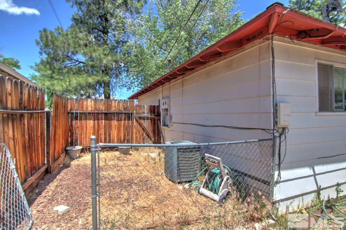 1300 Grandview Avenue Reno, NV 89503 - Photo 17 of 18 a backyard of a house with wooden fence