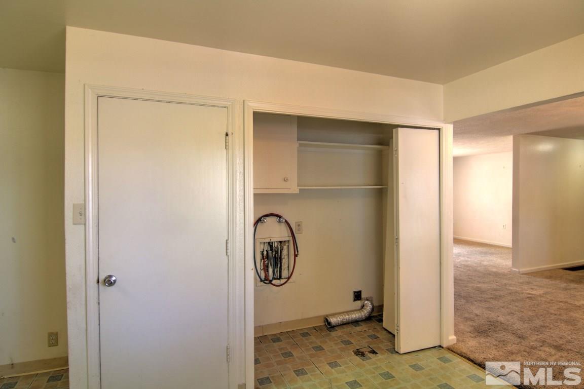 1300 Grandview Avenue Reno, NV 89503 - Photo 9 of 18 a bathroom with a granite countertop sink and a mirror