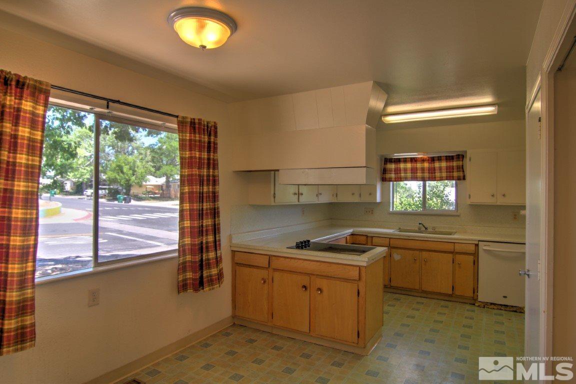 1300 Grandview Avenue Reno, NV 89503 - Photo 10 of 18 a kitchen that has a sink cabinets and a window