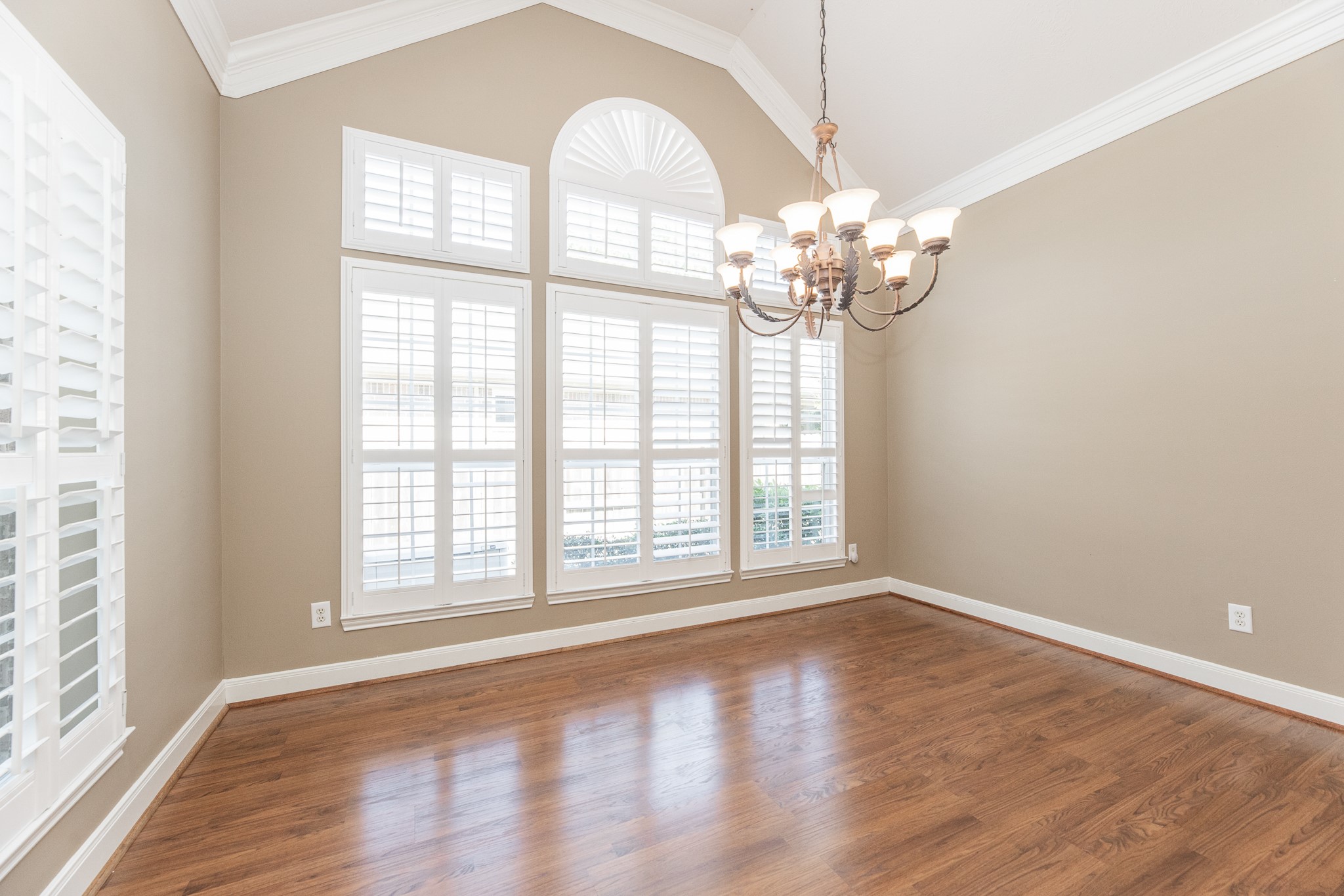 1222 Brinson Court Spring, TX 77379 - Photo 9 of 35 wooden floor in an empty room with a window