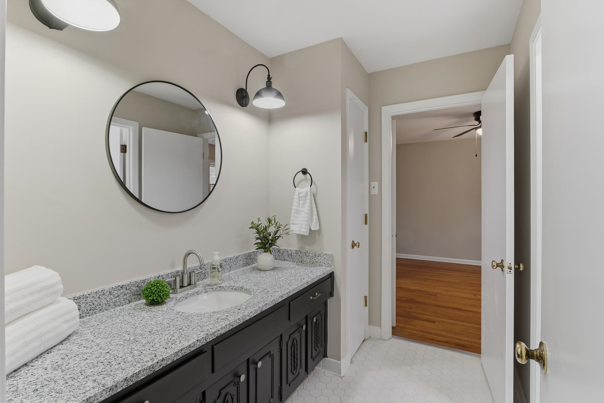 6436 Messick Road Memphis, TN 38119 - Photo 33 of 40 Bathroom featuring vanity and a ceiling fan