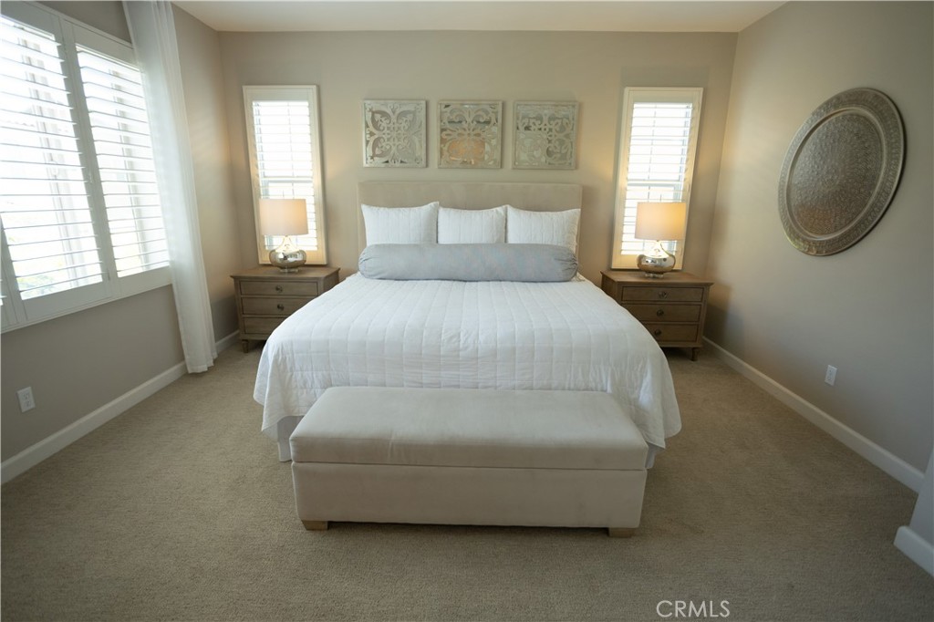 17 Honeysuckle Lake Forest, CA 92630 - Photo 18 of 36 a spacious bedroom with a bed and window
