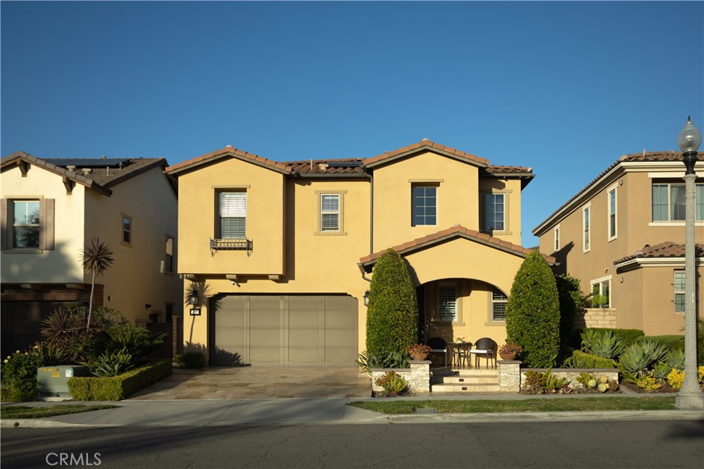 17 Honeysuckle Lake Forest, CA 92630 - Photo 2 of 36 a front view of a house with yard