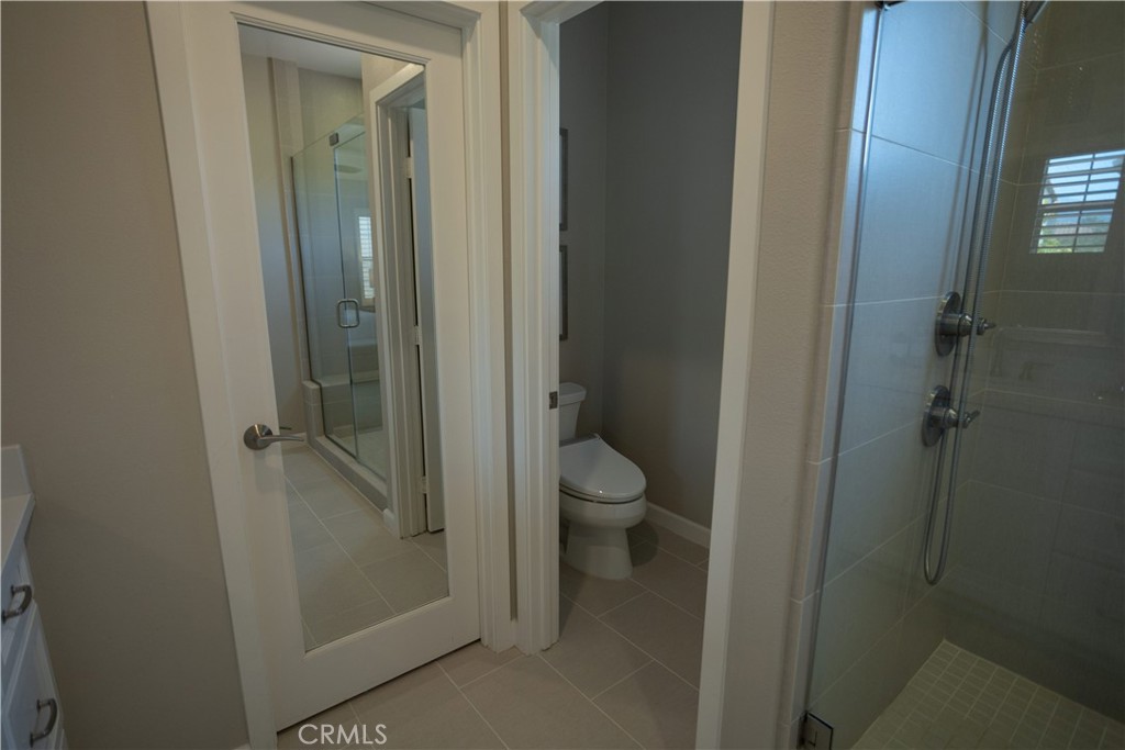 17 Honeysuckle Lake Forest, CA 92630 - Photo 22 of 36 a bathroom with a granite countertop toilet