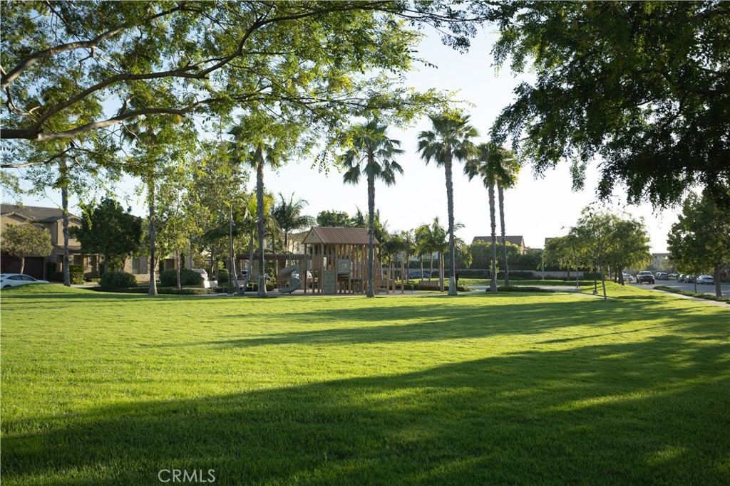 17 Honeysuckle Lake Forest, CA 92630 - Photo 31 of 36 a big yard with trees in front of it