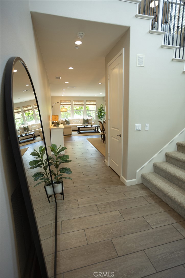 17 Honeysuckle Lake Forest, CA 92630 - Photo 7 of 36 a hallway with a view of living room
