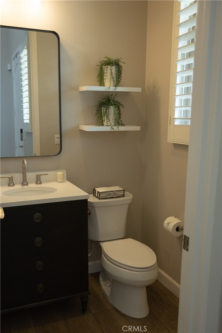 17 Honeysuckle Lake Forest, CA 92630 - Photo 8 of 36 a bathroom with a sink and a toilet