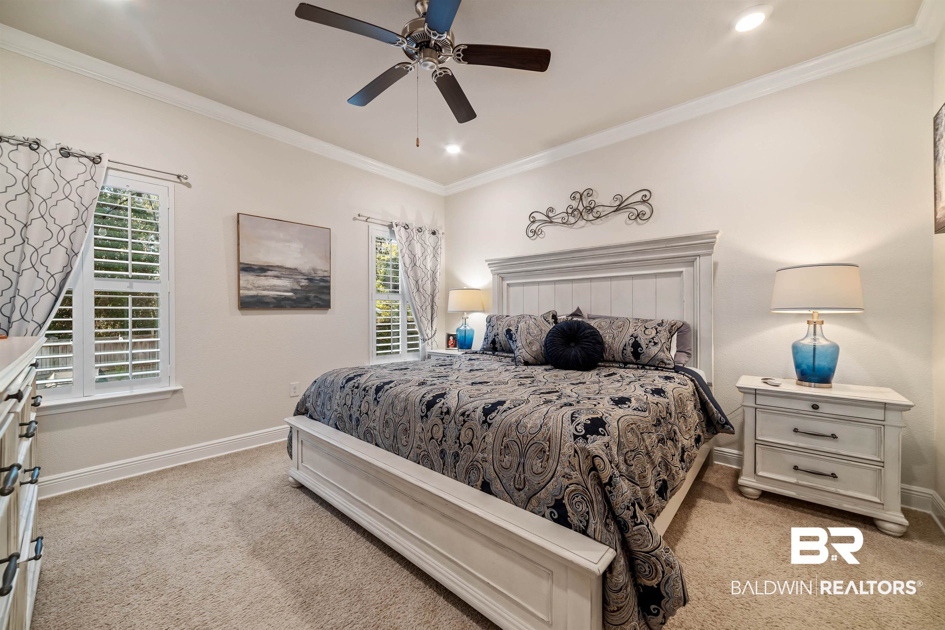 1290 Mako Loop Gulf Shores, AL 36542 - Photo 16 of 50 Bedroom featuring light carpet and crown molding
