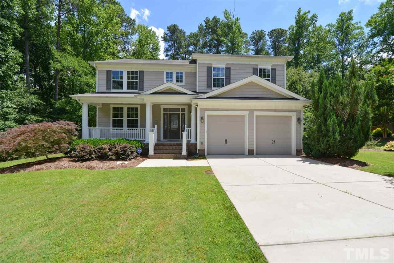 13015 Saxon Way Raleigh, NC 27613 - Photo 1 of 30 front view of a house with a yard