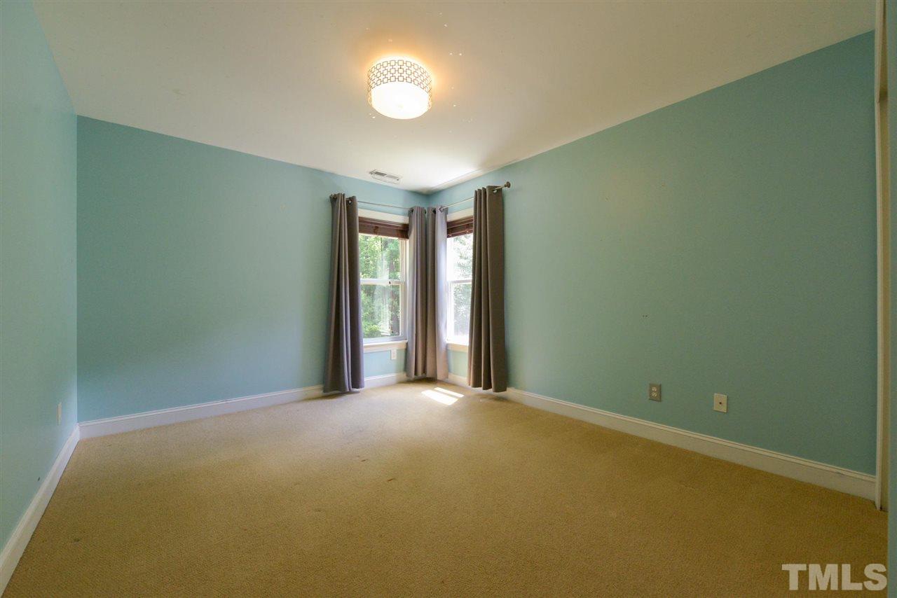 13015 Saxon Way Raleigh, NC 27613 - Photo 22 of 30 a view of an empty room with a window