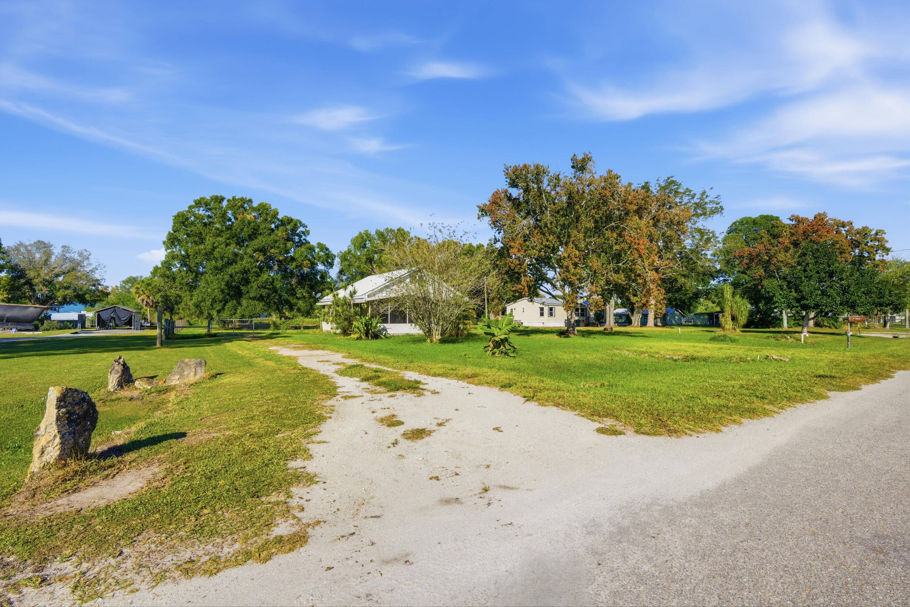 3765 Southwest 13th Terrace Okeechobee, FL 34974 - Photo 10 of 10 a view of a lake with a yard