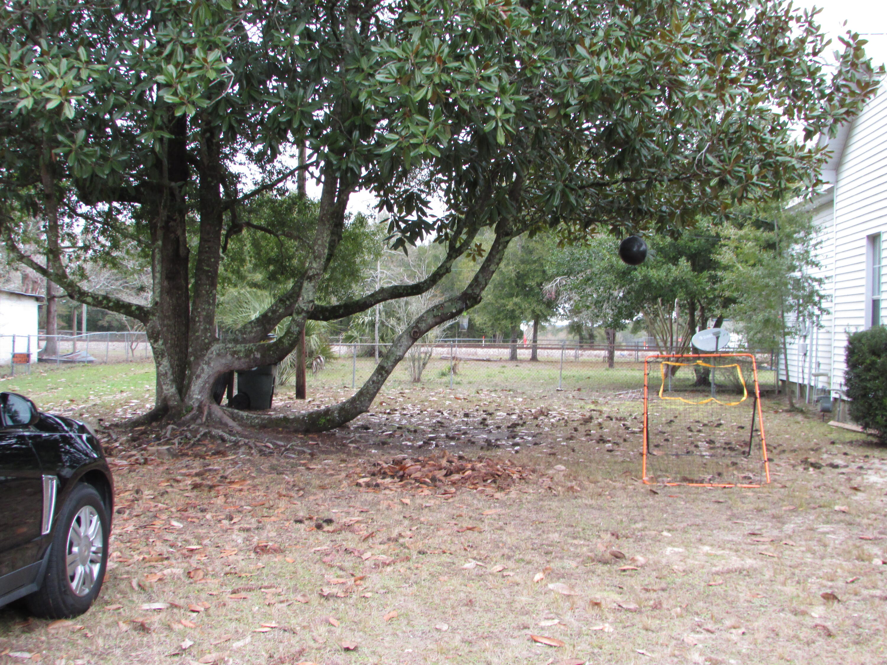 64 Live Oak Avenue West DeFuniak Springs, FL 32435 - Photo 18 of 20 a view of a park with large trees