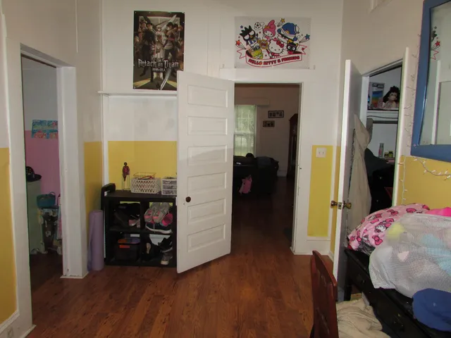 a bedroom with furniture and a bed