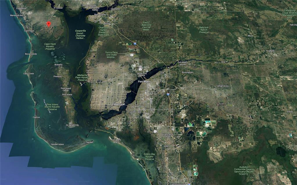 5 Cactus Way Placida, FL 33946 - Photo 17 of 20 an aerial view of a houses with yard