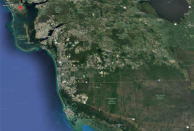 a picture of a bathroom with a shower