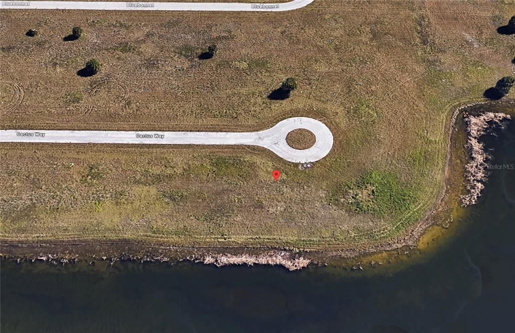 5 Cactus Way Placida, FL 33946 - Photo 3 of 20 a bathroom with a granite countertop sink
