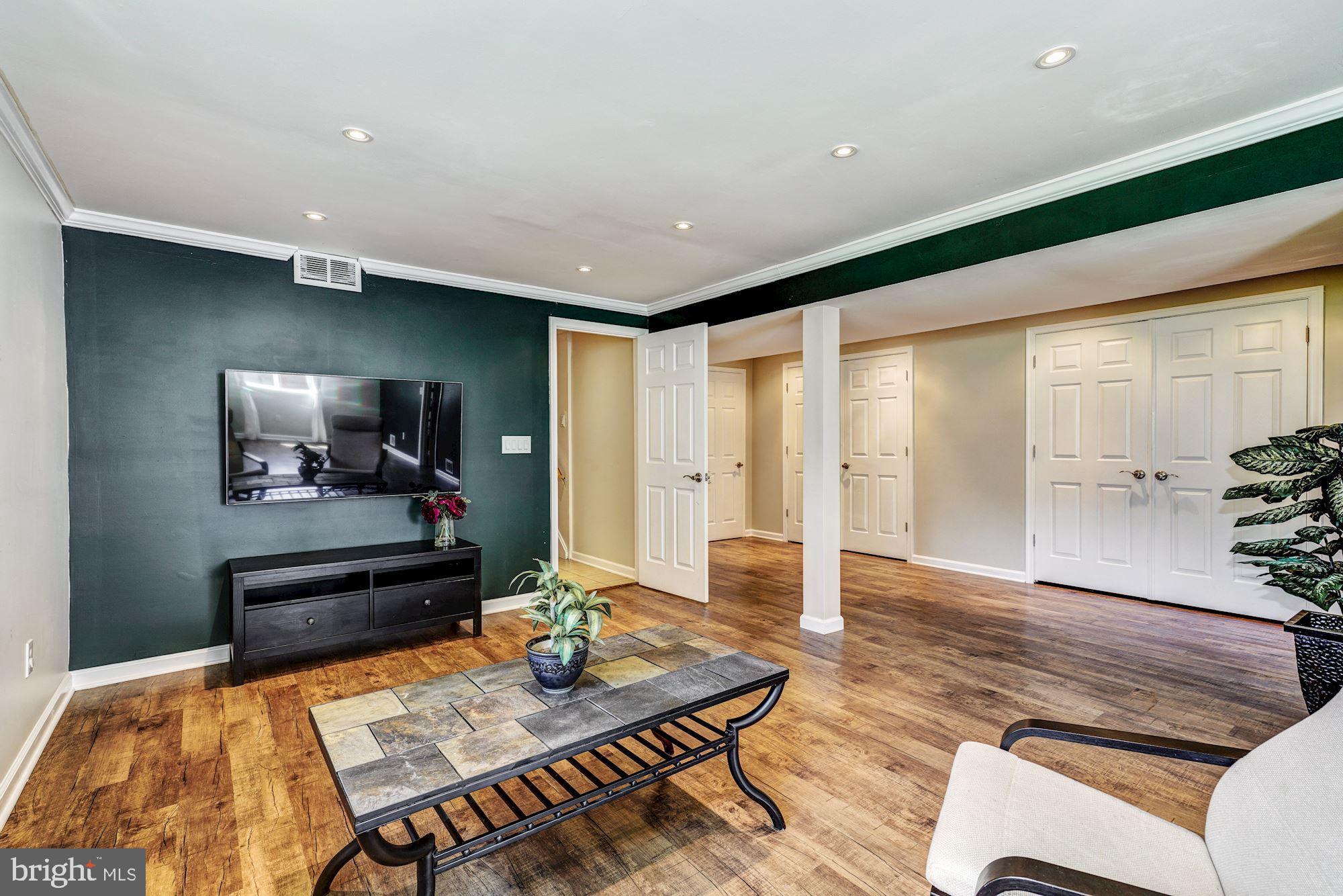 3409 Ramsgate Terrace Alexandria, VA 22309 - Photo 22 of 43 Lower lvl w/ beautiful flooring, recessed lights