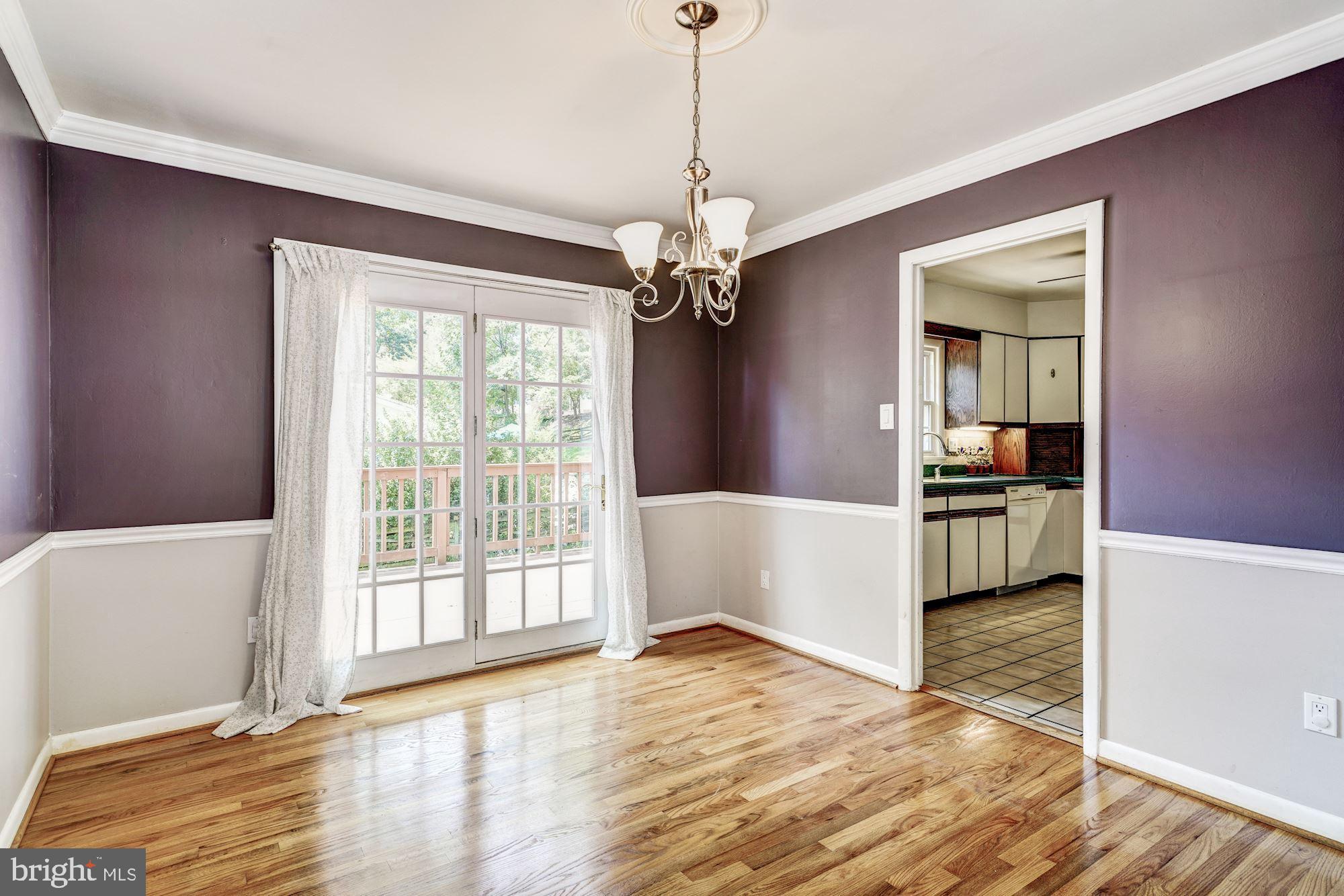 3409 Ramsgate Terrace Alexandria, VA 22309 - Photo 7 of 43 Dining Rm w/ crown molding, chair rail, wood flrs