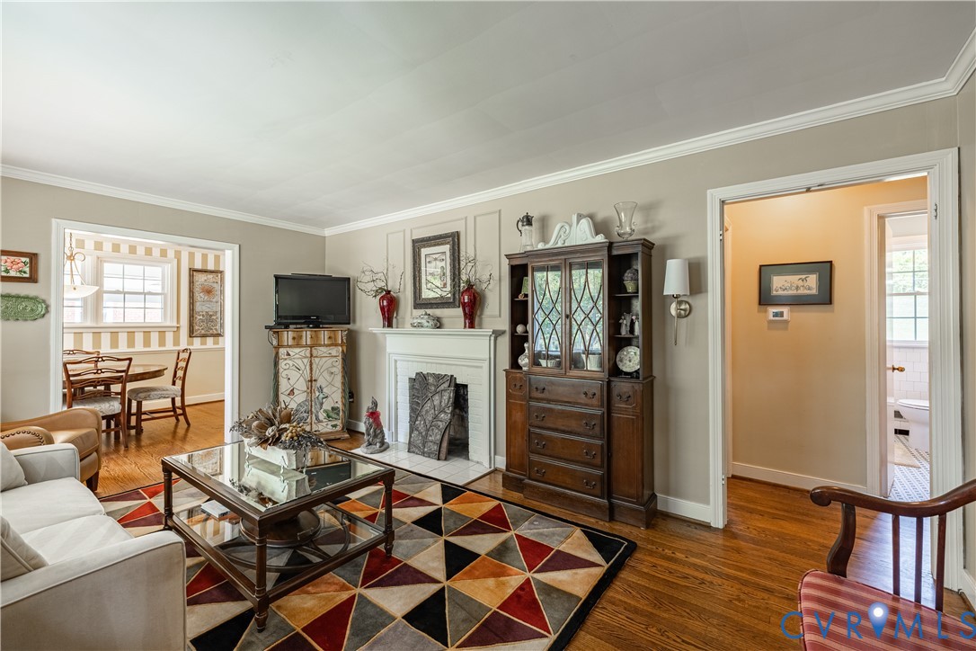 1107 Ridgecrest Drive Henrico, VA 23229 - Photo 5 of 26 Living area featuring wood flooring, crown molding