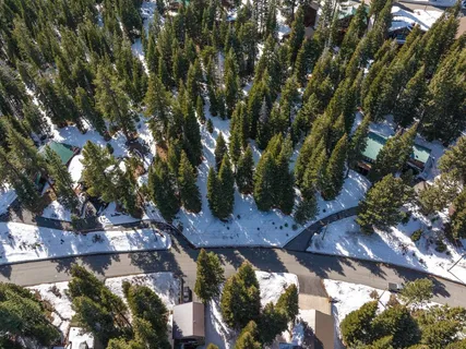 a view of swimming pool with a yard