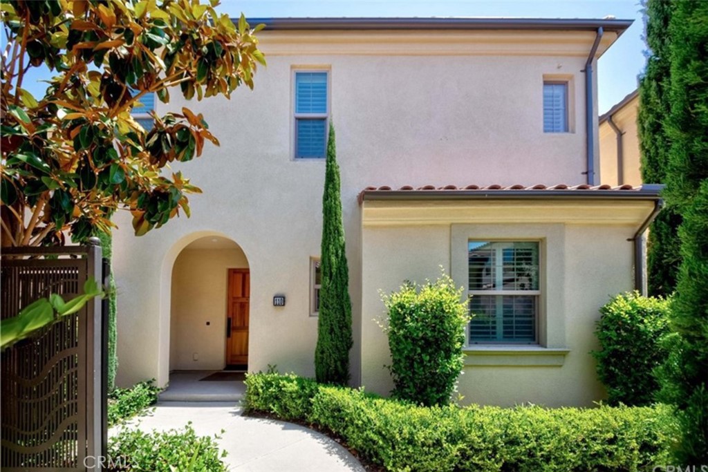 110 Fairbridge Irvine, CA 92618 - Photo 1 of 1 a front view of a house with a garden