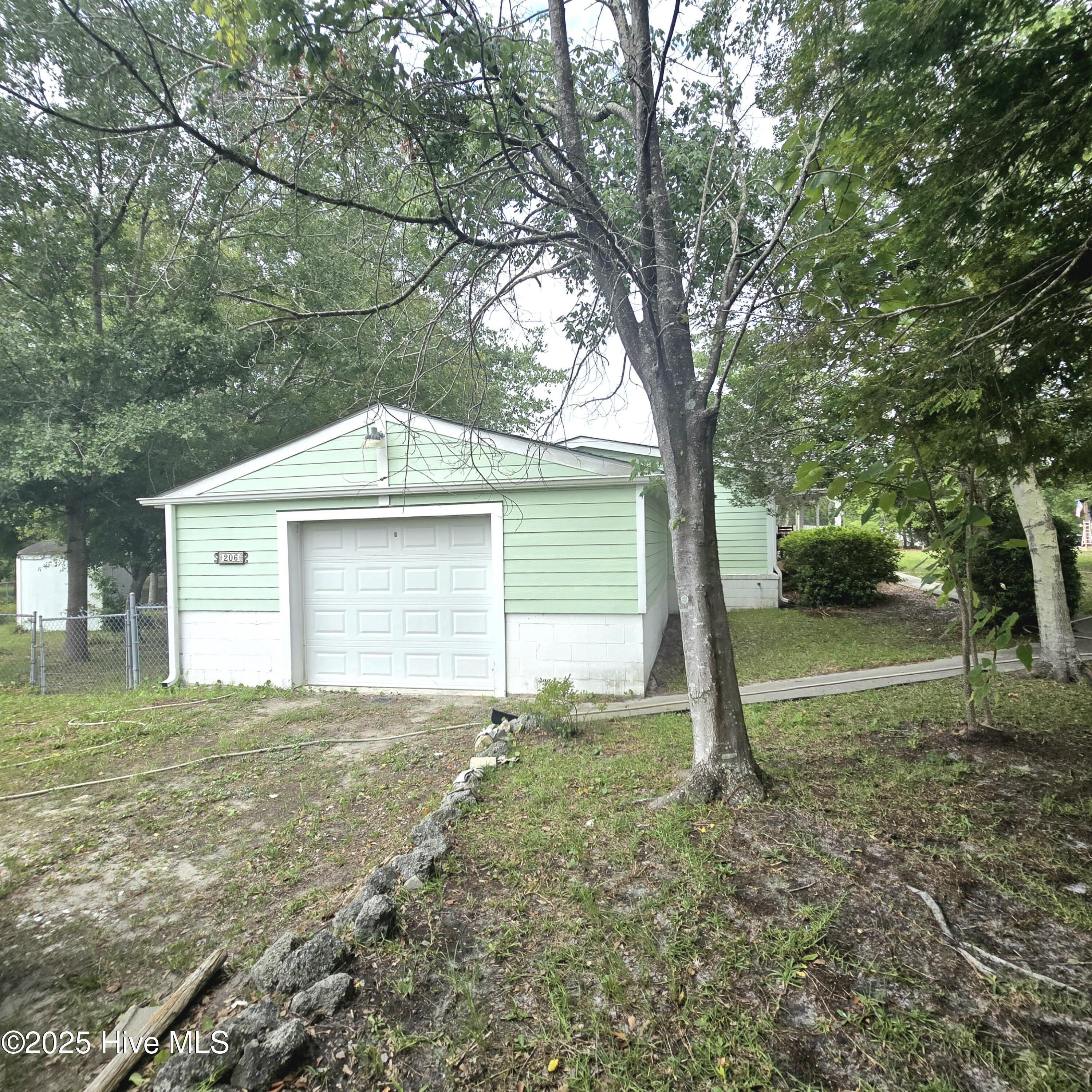 206 Holden Road Holly Ridge, NC 28445 - Photo 9 of 30 Garage