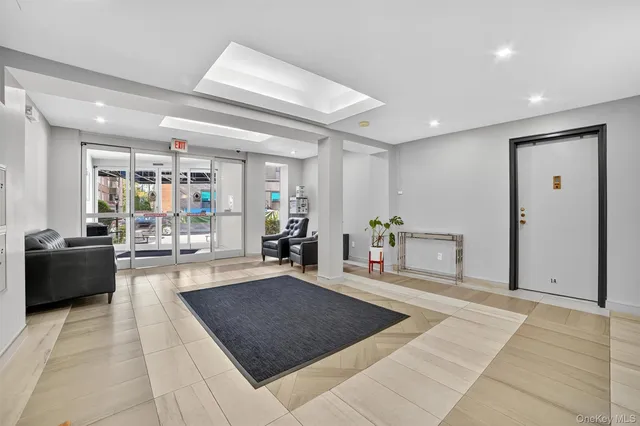 a living room with furniture and a rug
