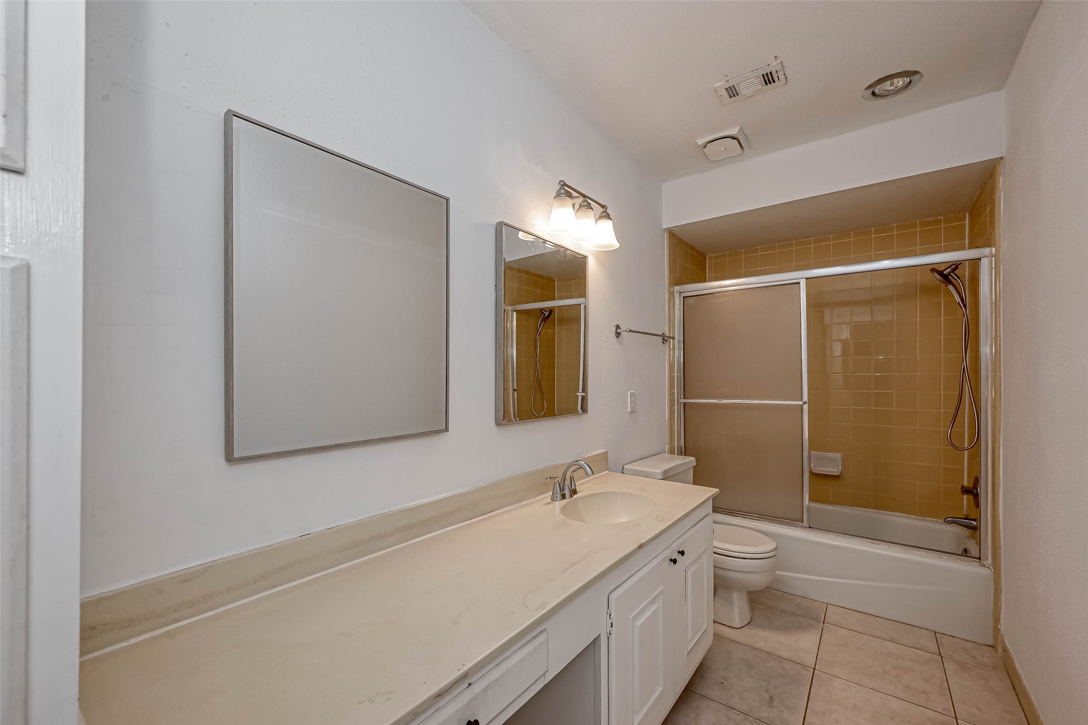 14179 Misty Meadow Lane Houston, TX 77079 - Photo 29 of 41 a bathroom with a granite countertop sink toilet and shower