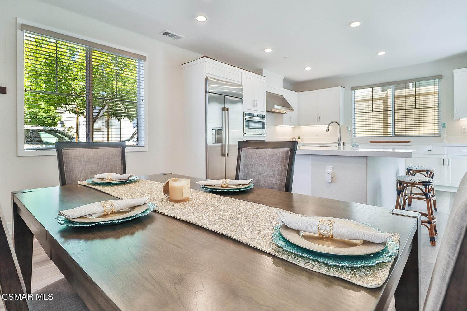 3068 Harrison Lane Simi Valley, CA 93065 - Photo 11 of 48 a living room with granite countertop furniture and a wooden floor