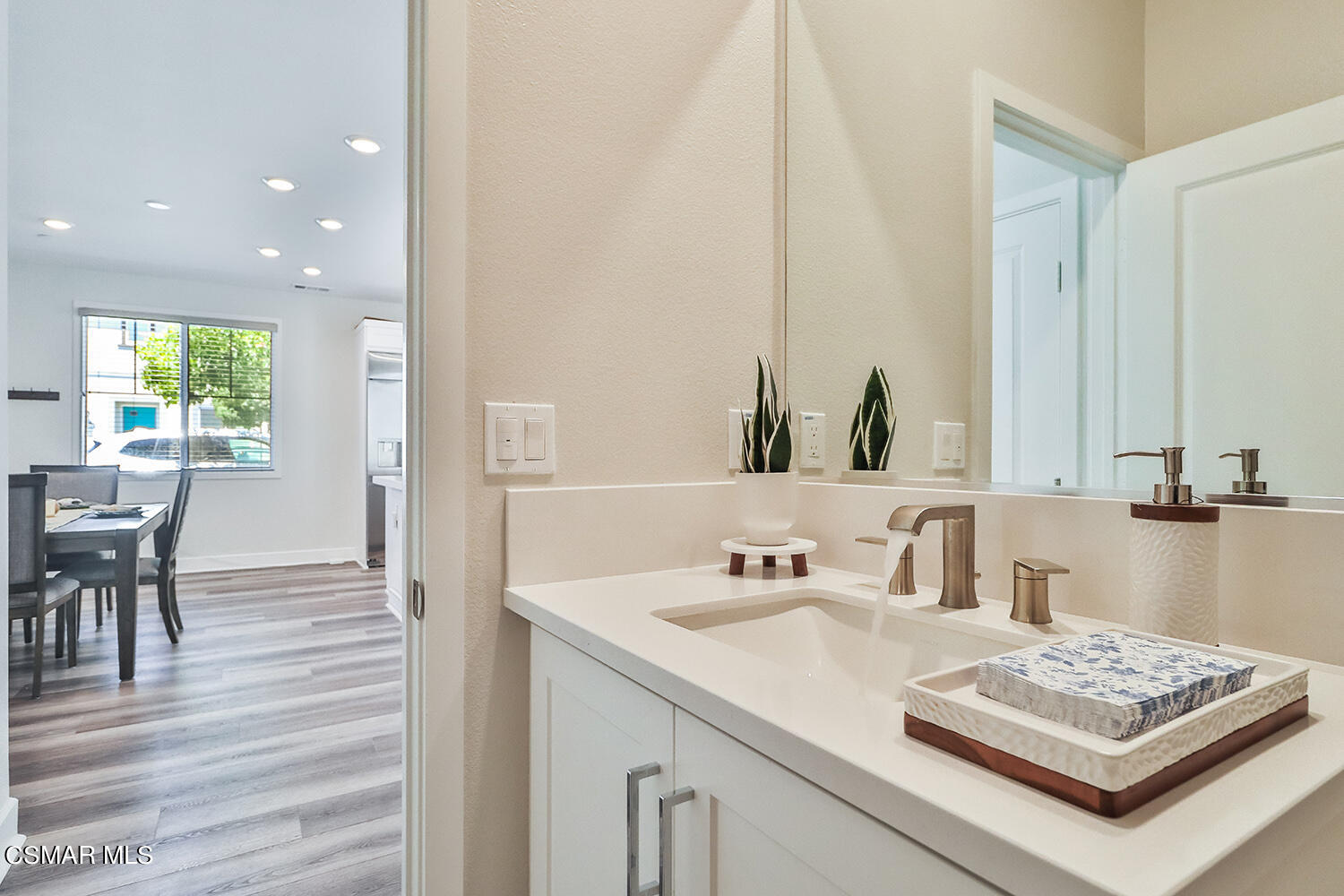 3068 Harrison Lane Simi Valley, CA 93065 - Photo 17 of 48 a bathroom with a sink and a mirror