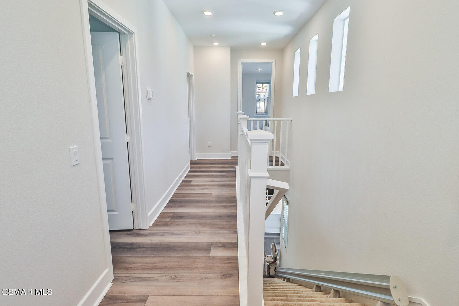 3068 Harrison Lane Simi Valley, CA 93065 - Photo 20 of 48 a view of a hallway with wooden floor and entryway