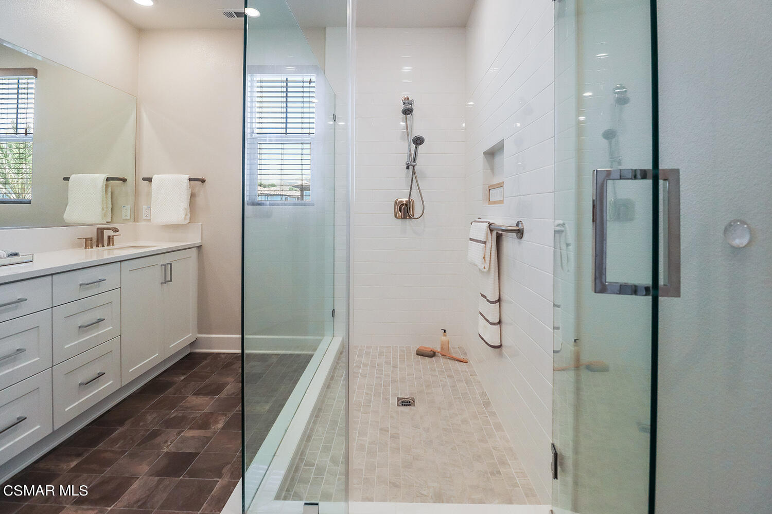 3068 Harrison Lane Simi Valley, CA 93065 - Photo 35 of 48 a bathroom with a shower sink and mirror