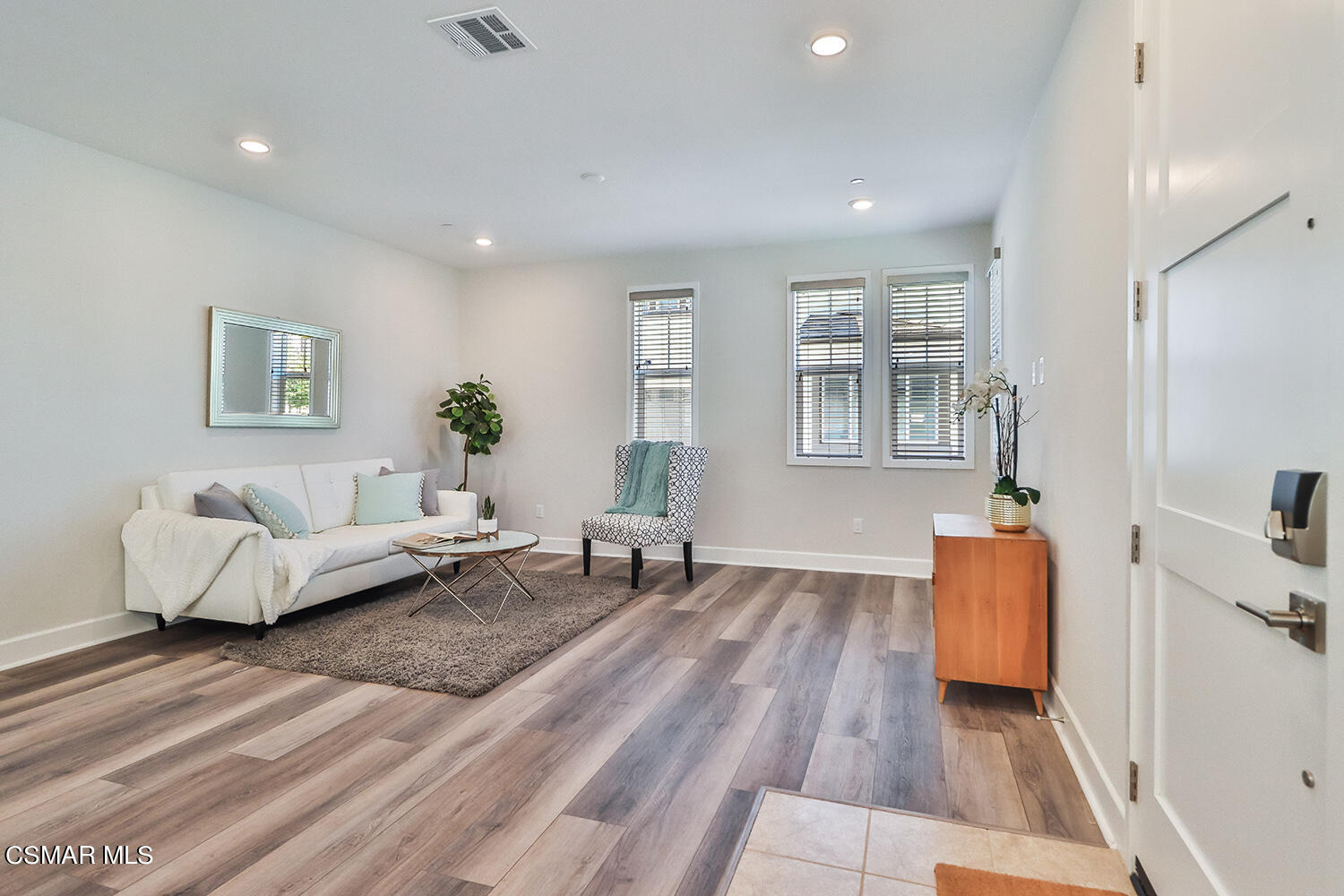 3068 Harrison Lane Simi Valley, CA 93065 - Photo 7 of 48 a living room with furniture and wooden floor