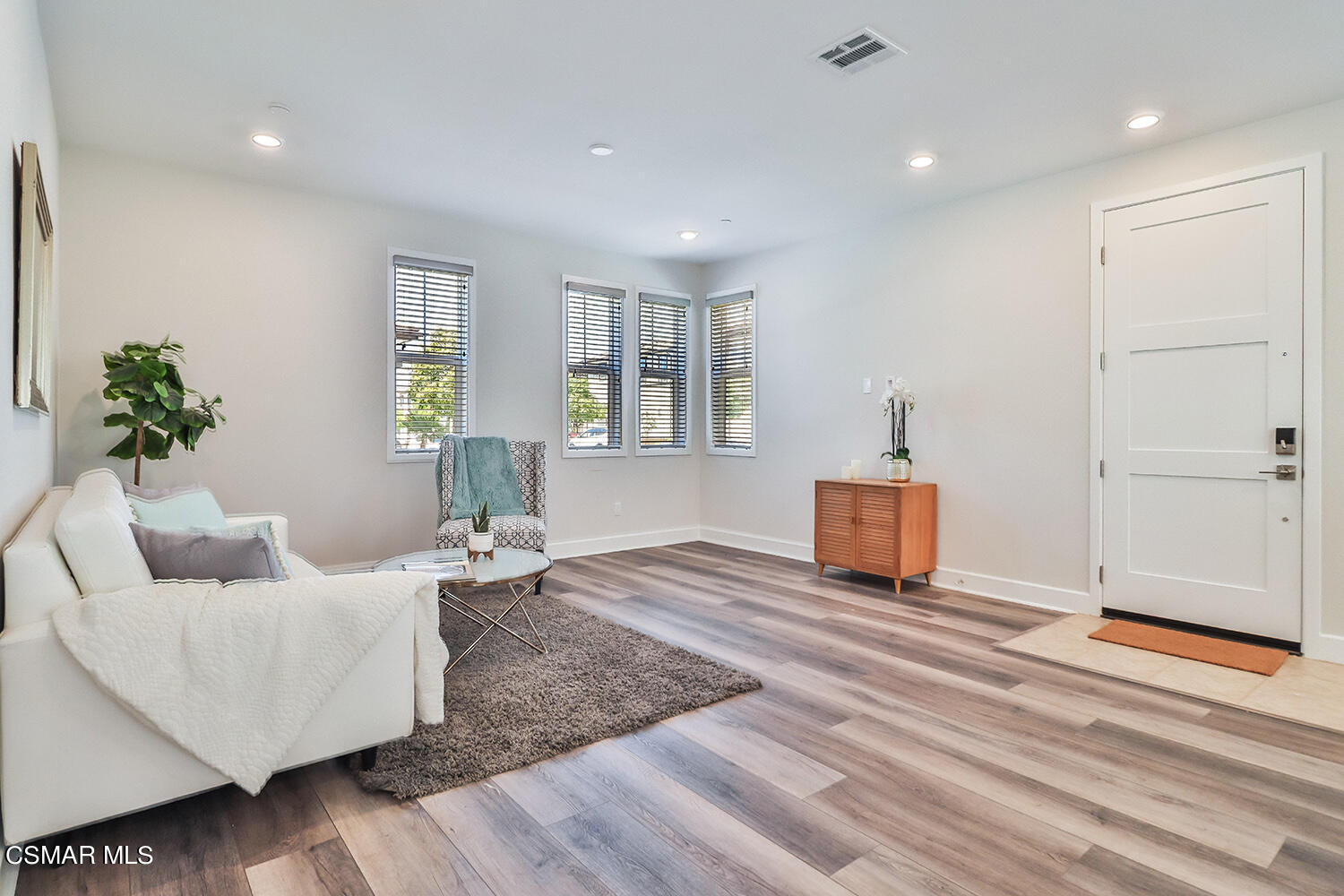 3068 Harrison Lane Simi Valley, CA 93065 - Photo 8 of 48 a living room with furniture and wooden floor