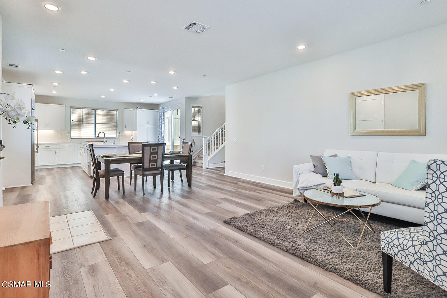 3068 Harrison Lane Simi Valley, CA 93065 - Photo 9 of 48 a living room with furniture and kitchen view