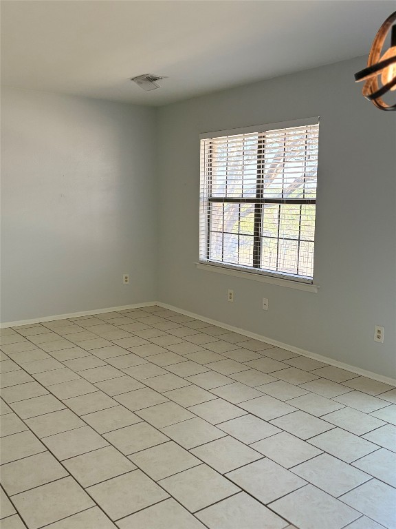 1919 American Drive, Unit A123 Leander, TX 78645 - Photo 3 of 13 an empty room with windows