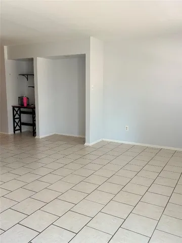 a bathroom with a shower and toilet