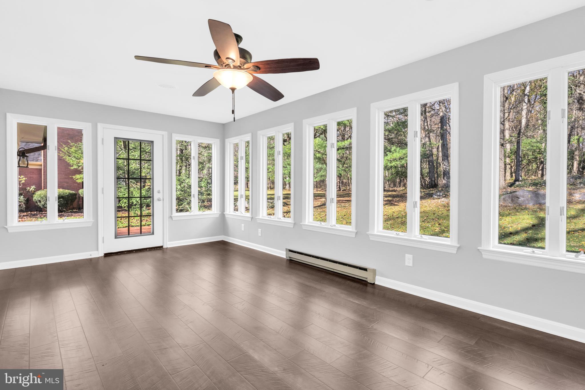 93 Hawick Road Inwood, WV 25428 - Photo 15 of 34 This Sunroom will be Your Favorite Hangout