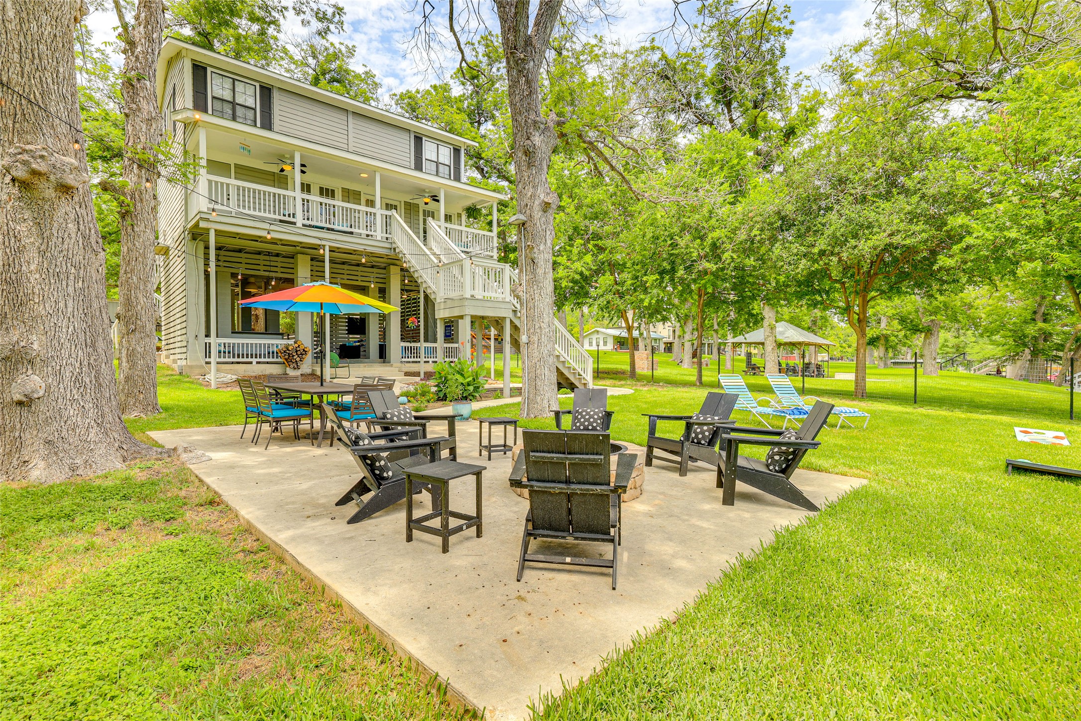 a building outdoor space with patio furniture and garden