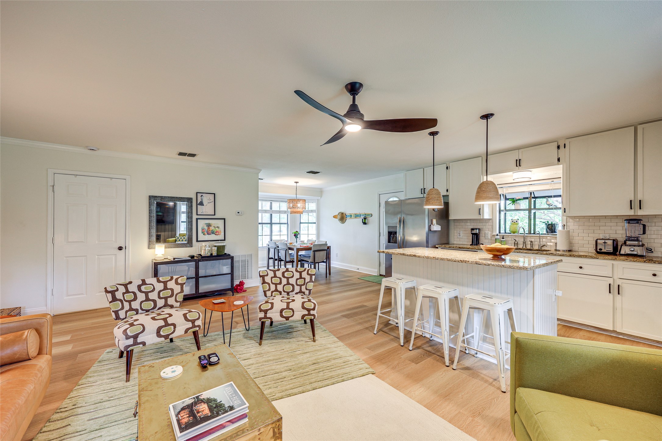 279 Waltons Way Seguin, TX 78155 - Photo 39 of 40 a living room with lots of furniture and kitchen view