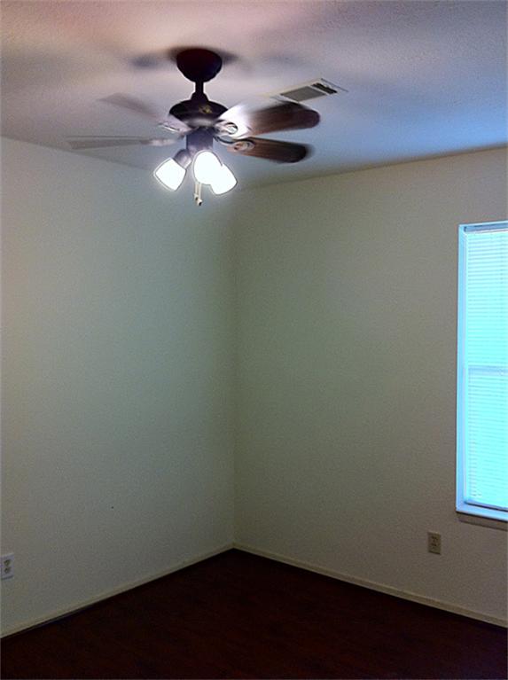 22310 Rangeview Drive Katy, TX 77450 - Photo 7 of 19 Bed 2 with new floor and ceiling fan